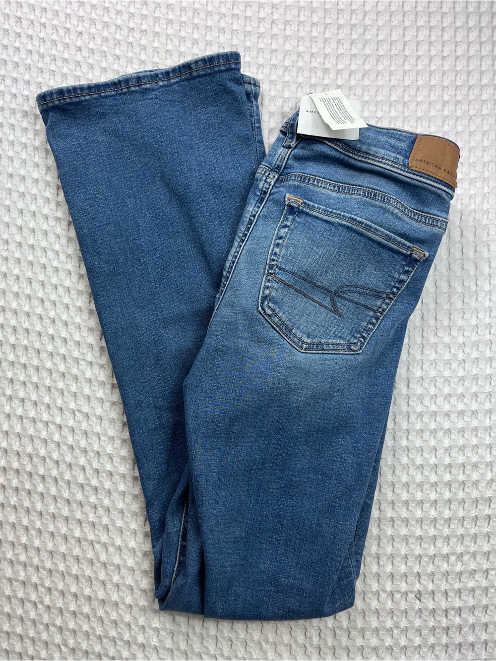 NWT. American Eagle Next Level Stretch Kick Boot Jeans Size 0 Short 25W